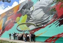 Sportieve schildering op muur